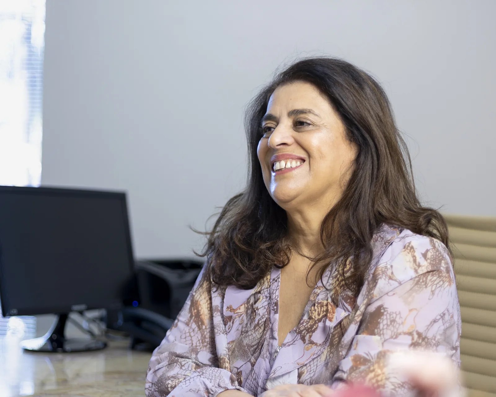 Dra. Morgana Ortolan em atendimento no consultório